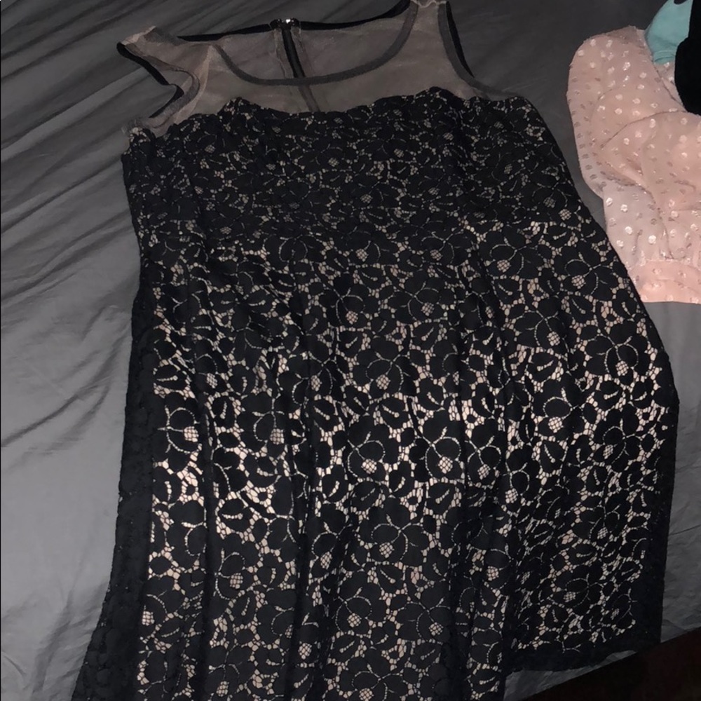 Black and tan dress with the zipper back